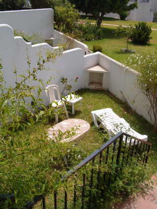 Private rear garden leading to communal gardens